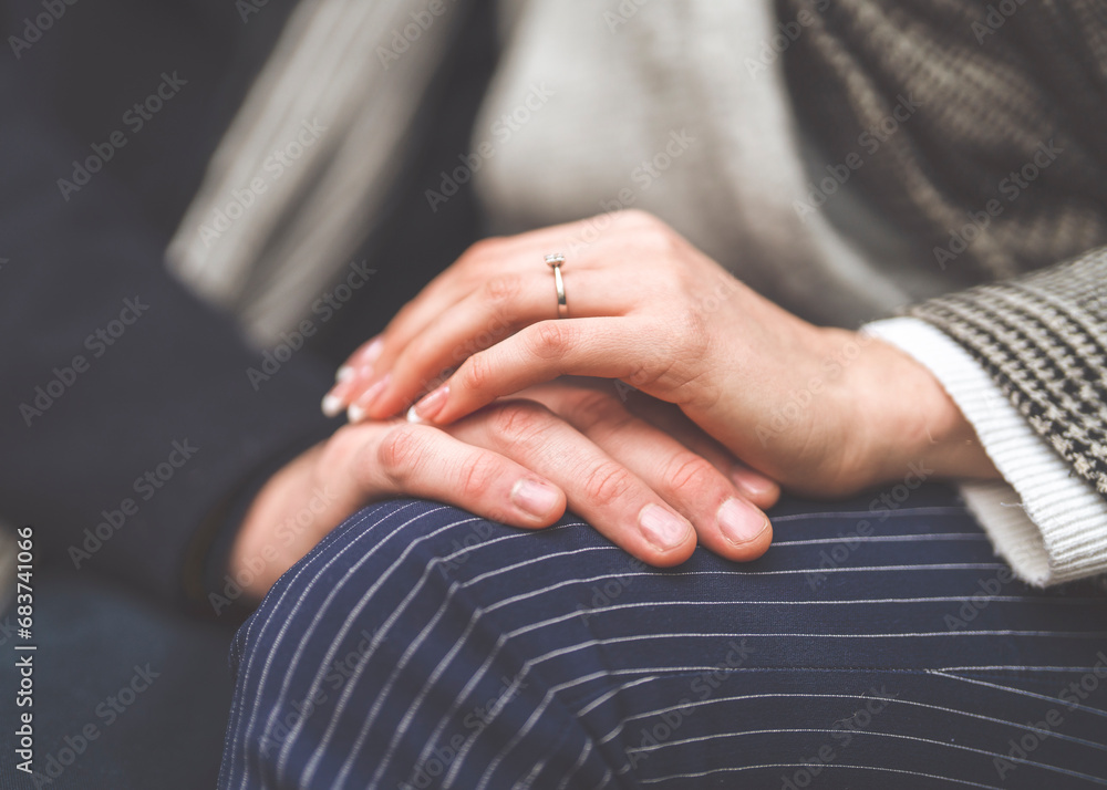 close-up of a man and a woman hand in hand. close-up of a man and a woman hand in hand.