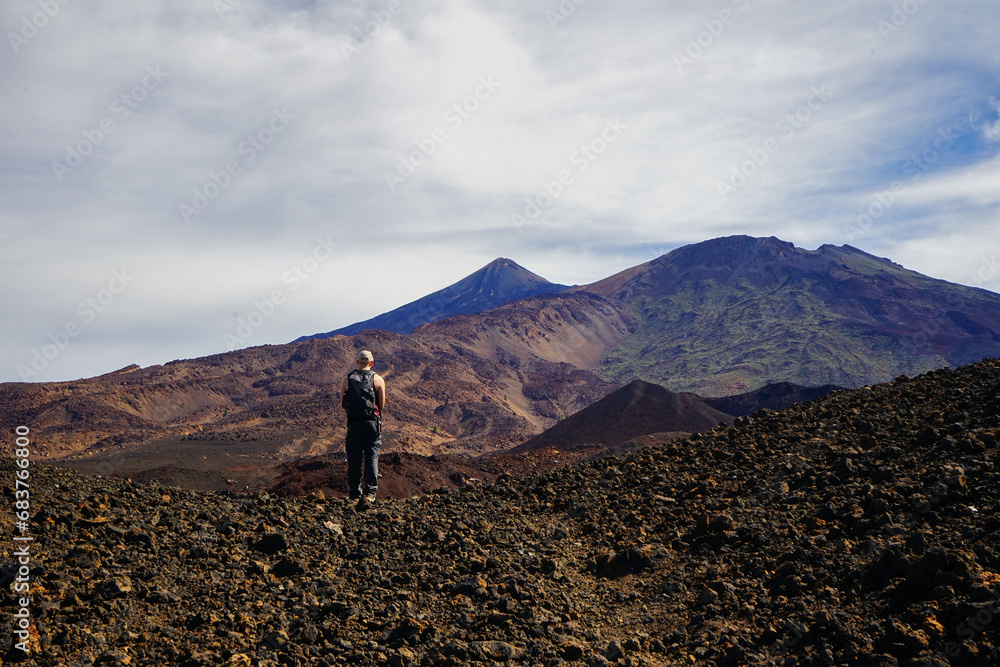 Hiker walking to Teide volcano summit, Tenerife, Canaries, Spain