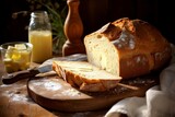 Freshly Baked White Bread, Perfectly Golden, Resting on a Rustic Wooden Table, Paired with Creamy Butter and a Knife, Ready for a Hearty Breakfast