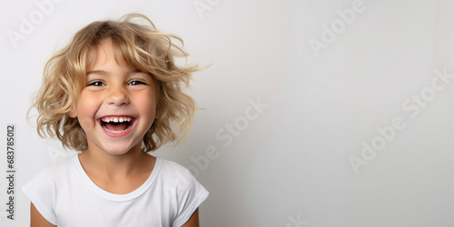 Radiant Joy: Carefree Laughing Child in Isolation on White Background