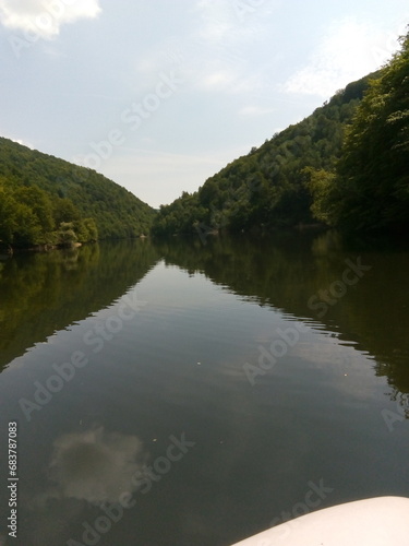 reflection of cloud in river