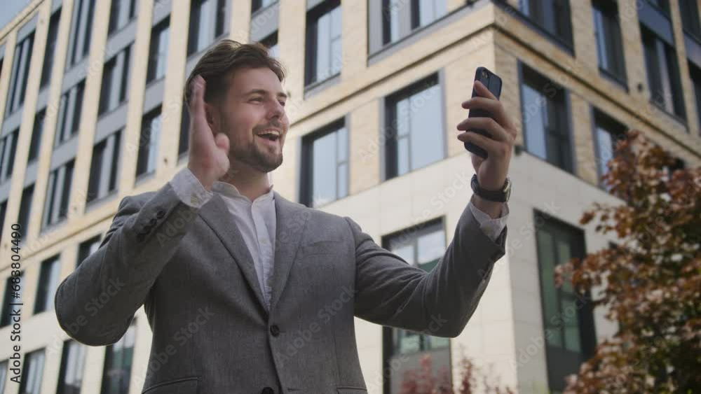 Businessman Greeting Gesture on Video Call Using Smartphone Businessman Greeting Gesture on Video Call Using Smartphone