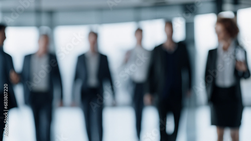 unrecognizable motion blurred business people in an office. Abstract office background © Jarama