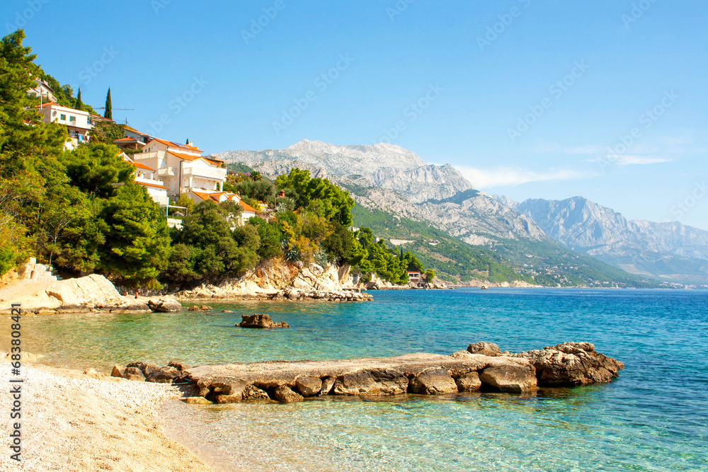 Blue sea of ​​Croatia and beautiful mountains. Landscape on a sunny day. Vacation concept