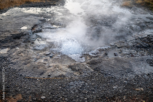 Mini geyser in Secret Lagoon, Iceland