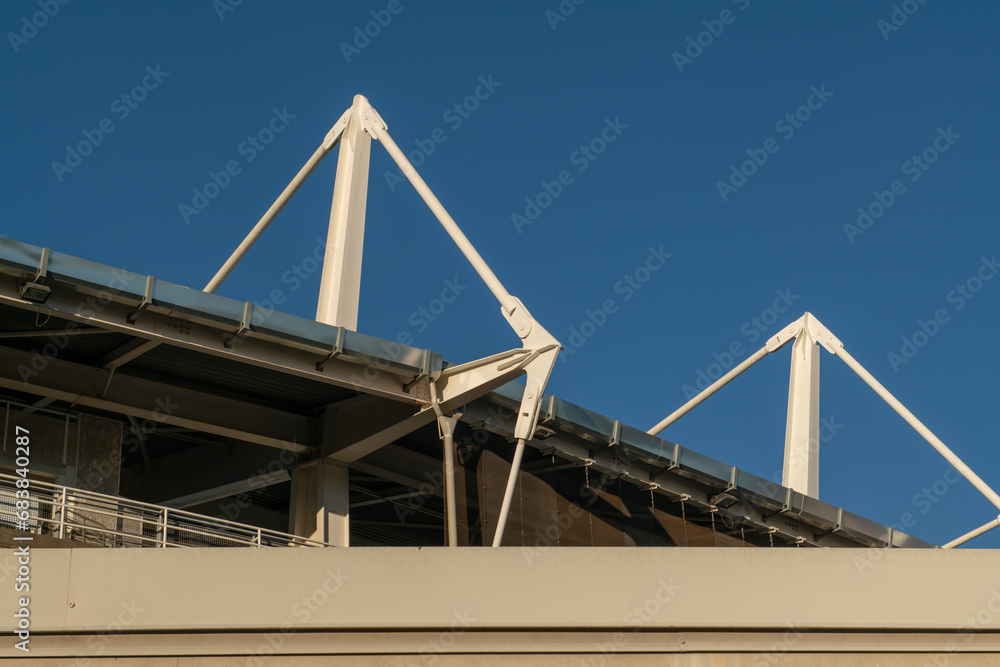 Obraz premium steel tie rods, restoration of the stadium roof with steel structures and tie rods, with steel tie rods and lever structure. constructive detail. Turin, Italy, 25 November 2023.