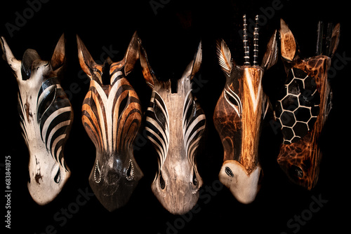 Wooden animal masks with black background