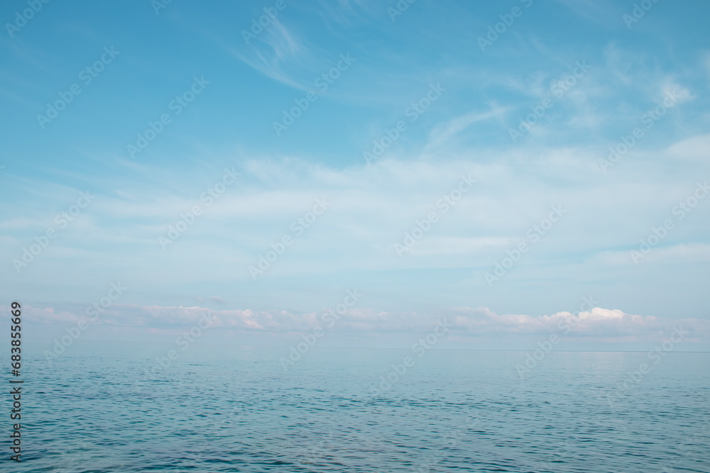 Blue ocean panorama, expansive scene with clear sky, ripple wave and calm sea with beautiful sunshine