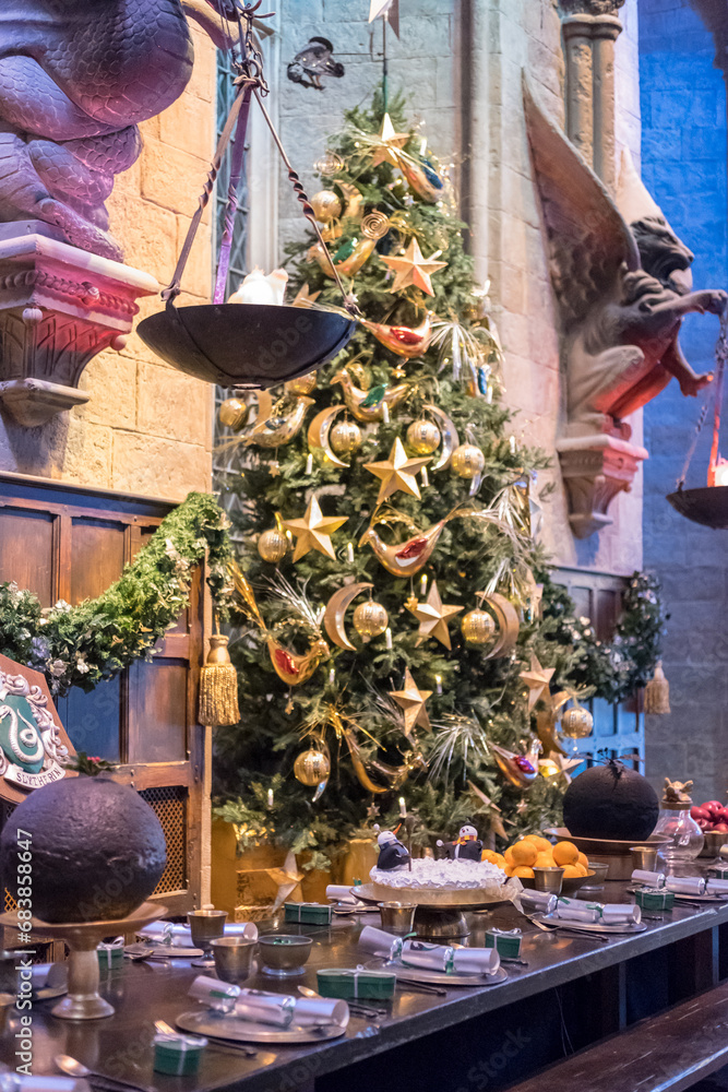Naklejka premium London, England - 18 November 2017: Christmas Decoration in the Great Hall of Hogwarts in Warner Brothers Studio tour, The making of Harry Potter at Leavesden Studio in London.