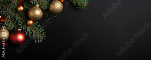 Top view Christmas and New Year black banner with empty space for placing advertising text with fir branches and Christmas tree decorations. Flat lay long banner. Festive backdrop for party invitation