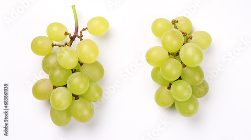 Cut bright-colored Muscat grapes on a pale background from above. photo