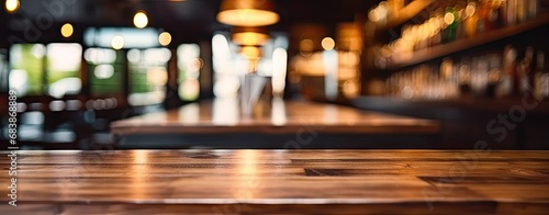 Vintage elegance. Blurred wooden table in dimly lit cafe ideal for creating retro atmosphere and showcasing products or ambiance