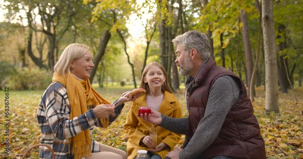 Outdoor little girl having fun with happy grandpa and grandma Outdoor little girl having fun with happy grandpa and grandma
