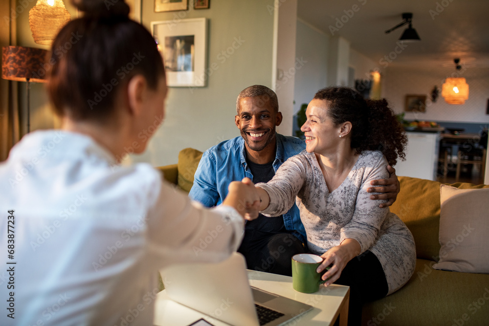 Therapist talking to a couple about their problems at home Therapist talking to a couple about their problems at home