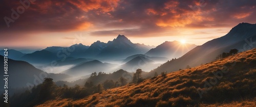 The first light of sunrise peeking through a misty mountain pass, illuminating the peaks and valleys