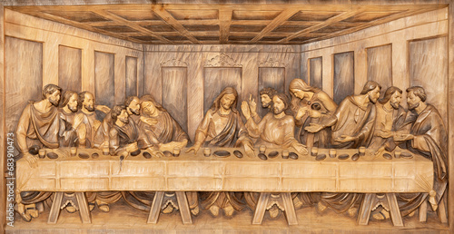 VICENZA, ITALY - NOVEMBER 6, 2023: The carved relief of Last Supper in the menza of church Chiesa di San Giacomo Maggiore from 20. cent. 