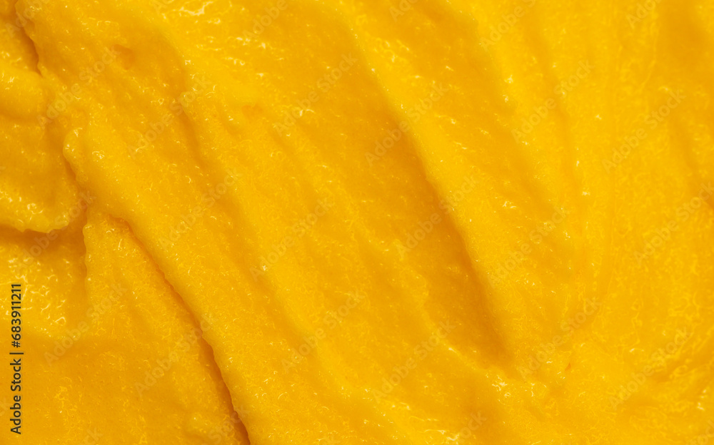 Fruit yogurt ice cream. Smoothies from fresh fruits and berries. Ice cream texture. Delicious sweet dessert close-up as a background. Fruit yogurt ice cream. Smoothies from fresh fruits and berries. Ice cream texture. Delicious sweet dessert close-up as a background.