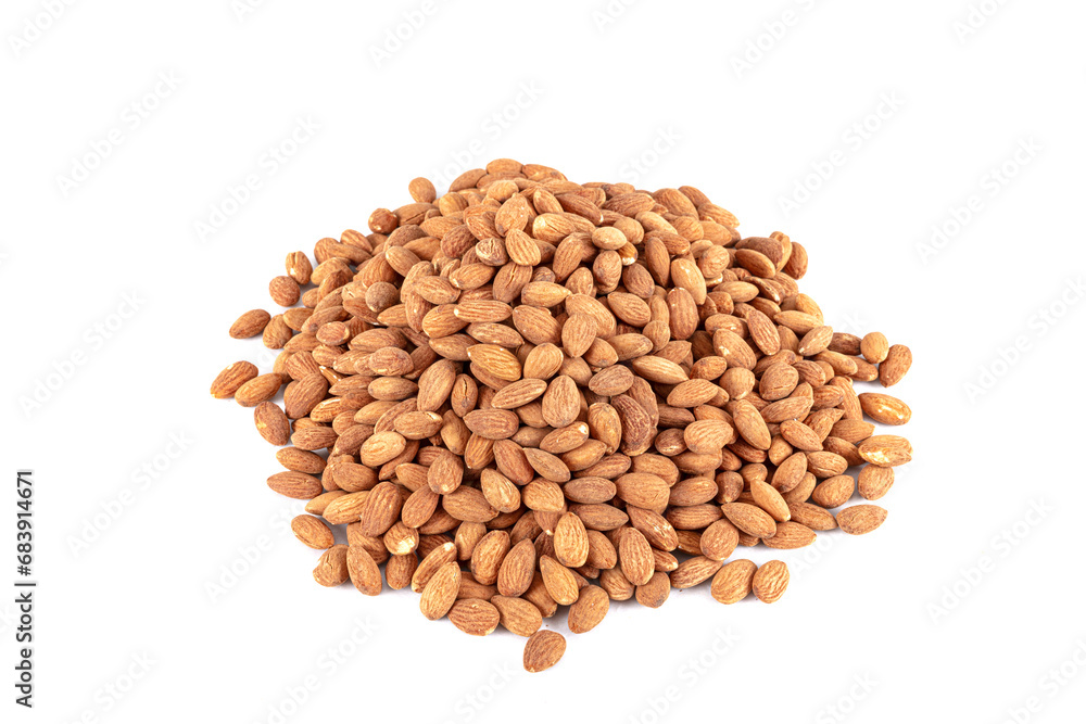 A portion of hickory smoked almonds isolated on a white background. Background of large raw shelled almonds, arranged randomly shot large, shelled nuts for vegans. A portion of hickory smoked almonds isolated on a white background. Background of large raw shelled almonds, arranged randomly shot large, shelled nuts for vegans.