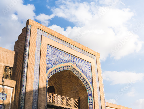 Facade of the Matniyaz Divanbegi Madrasah building in the ancient city of Khiva in Khorezm