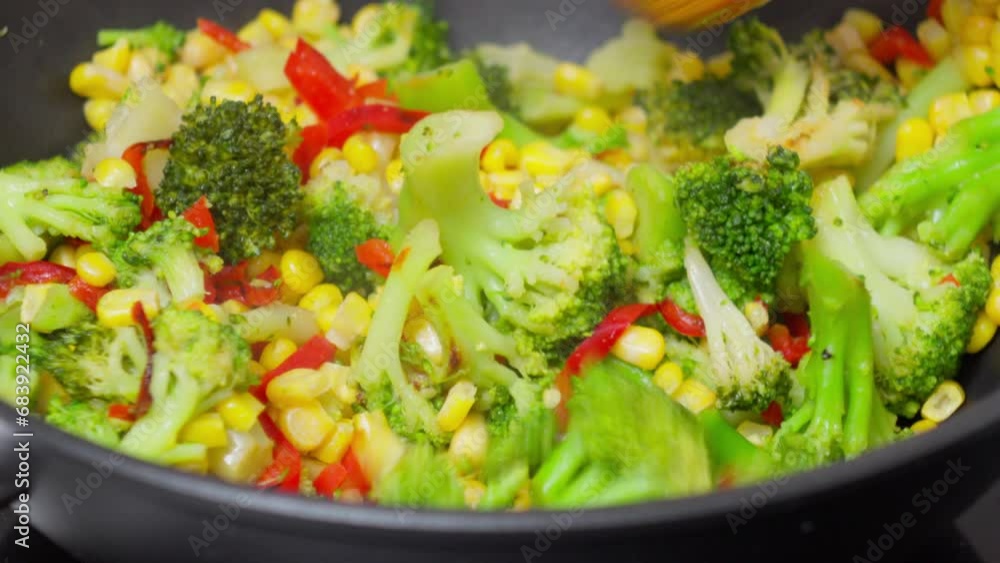 Delicious Veggie Medley Simmering on the Stove. Wok frying pan Delicious Veggie Medley Simmering on the Stove. Wok frying pan
