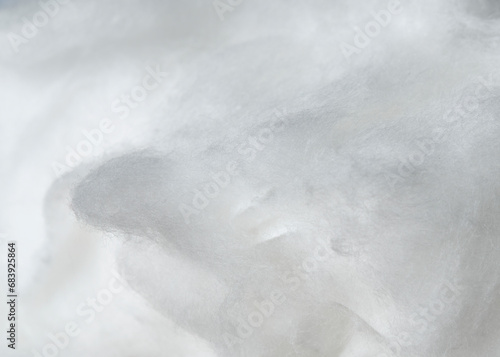 Photo of white fluffy cotton, abstract luxury wadding cloud texture background