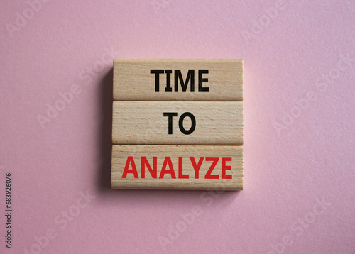 Time to Analyze symbol. Concept word Time to Analyze on wooden blocks. Beautiful pink background. Business and Time to Analyze concept. Copy space
