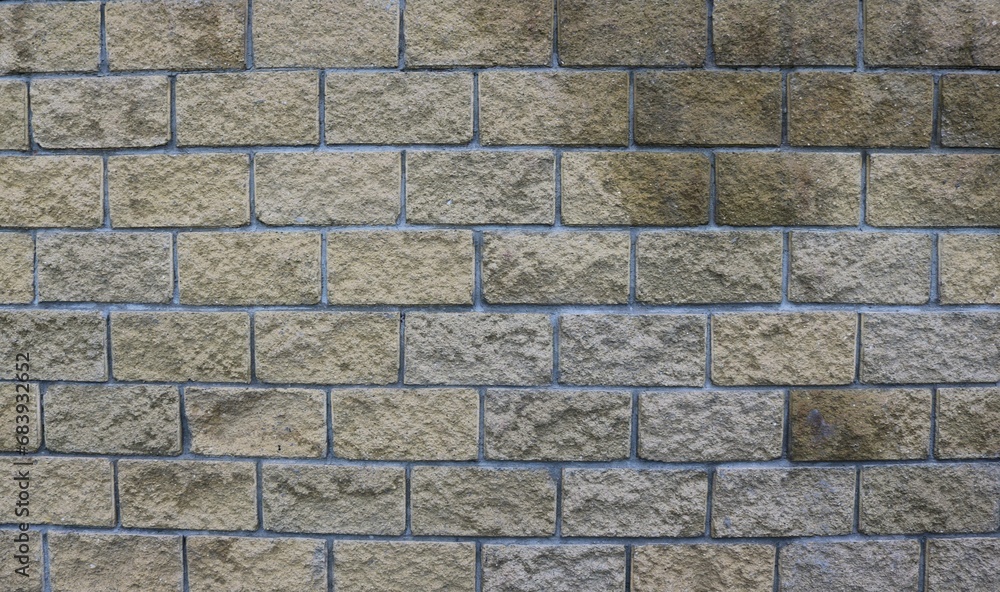 graphic resource of brickwork in brown and gray tones, with an uneven textured surface of lines and rectangles, brick backdrop with empty space for insertion graphic resource of brickwork in brown and gray tones, with an uneven textured surface of lines and rectangles, brick backdrop with empty space for insertion