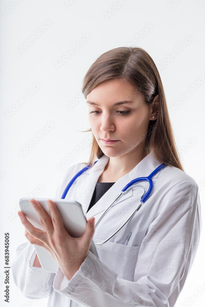 Doctor displays solemn responsibility with technology Doctor displays solemn responsibility with technology