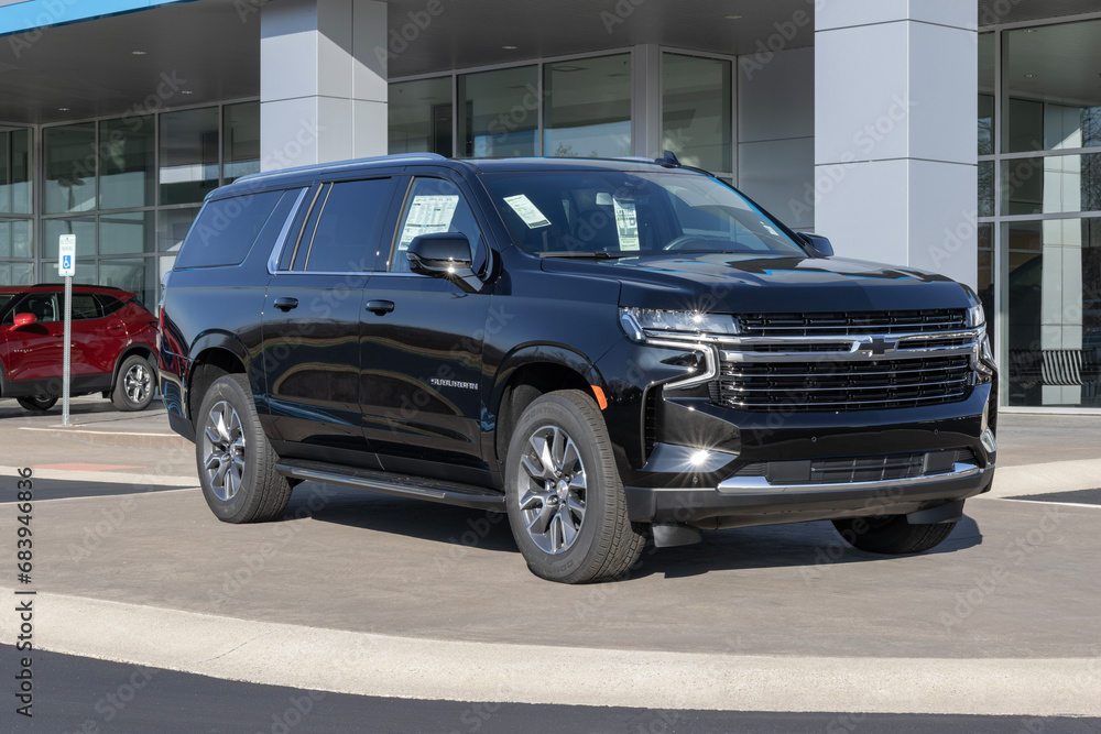 Chevrolet Suburban display at a dealership. Chevy offers the Suburban ...