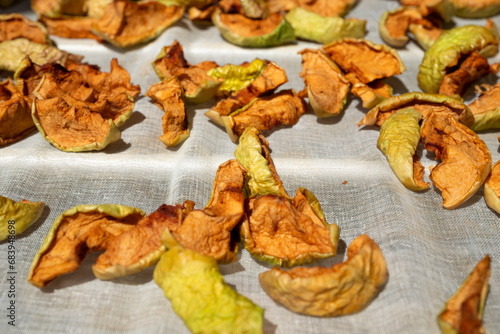 Close-up shot of dried sliced ​​apples for vegans, Close-up shot of dried apples spread on meringue