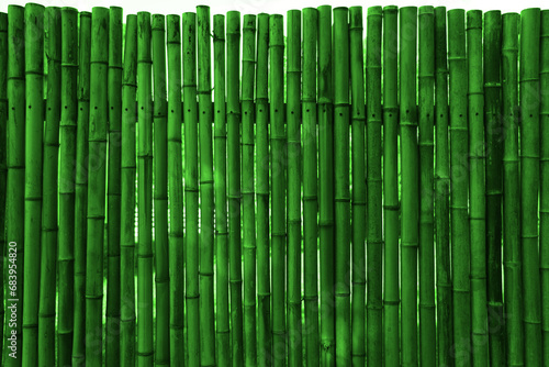 architectural green bamboo wall for japanese mood decoration  interior or exterior design. old green bamboo plank fence texture used as background with blank space for design.