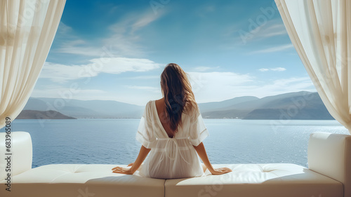 photo view at young attractive woman relaxing on luxury yacht floating on a blue sea © hamzagraphic01
