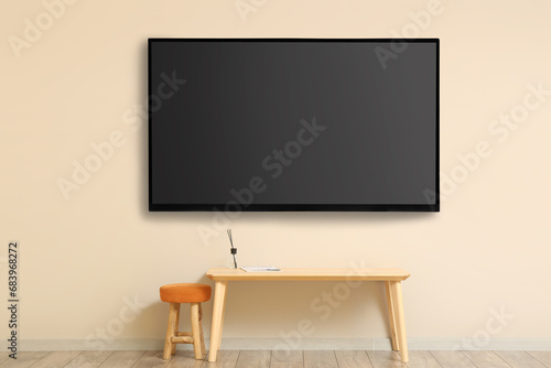 Modern smart TV set hanging...