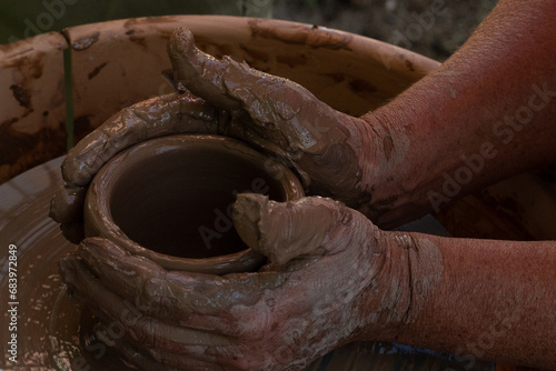 hands of a potter, pottery