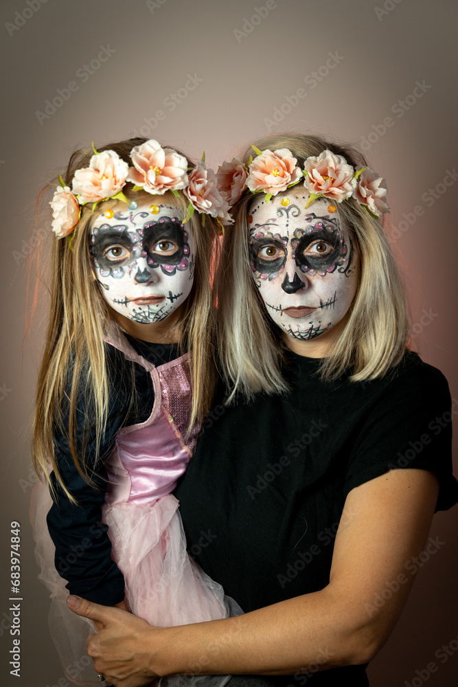 mom daughter face paint for festive scary halloween party flowers