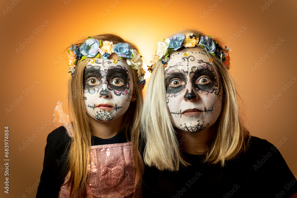mom daughter face paint for festive scary halloween party flowers