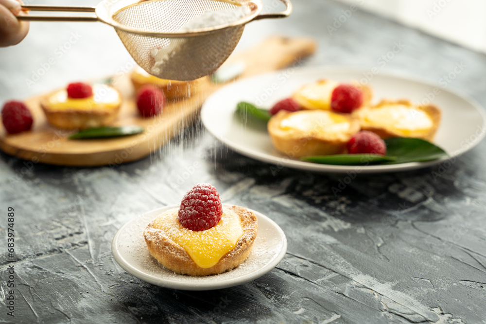 Homemade lemon pie with raspberry