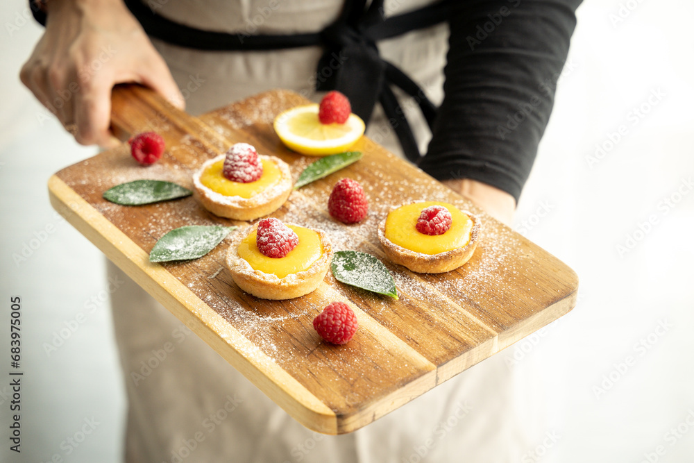 Homemade lemon pie with raspberry