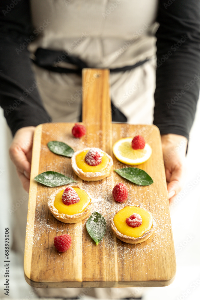 Homemade lemon pie with raspberry