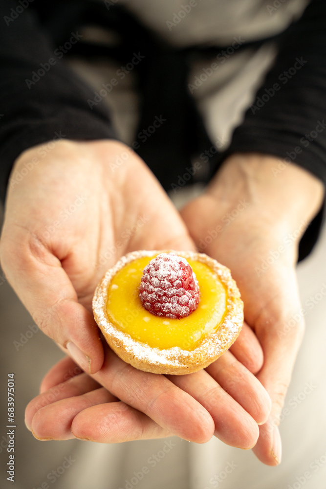 Homemade lemon pie with raspberry