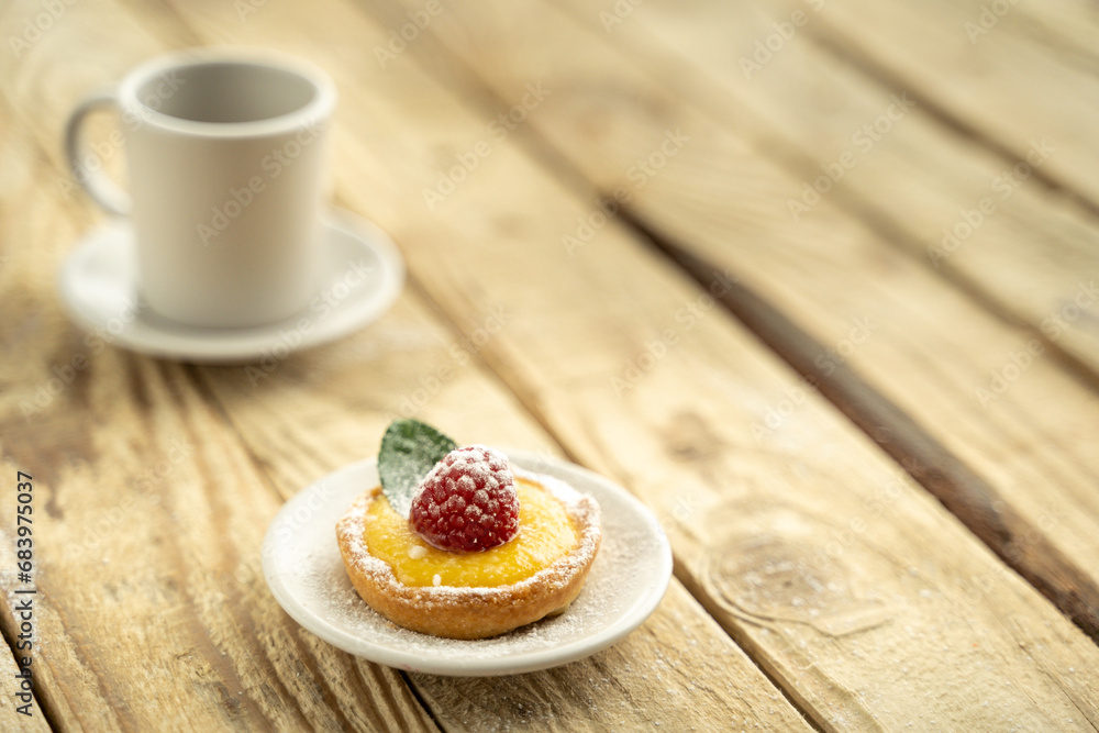 Homemade lemon pie with raspberry