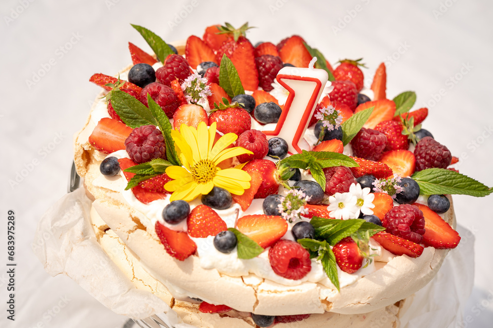 1 first birthday cake pavlova with fresh fruit berries flower candle