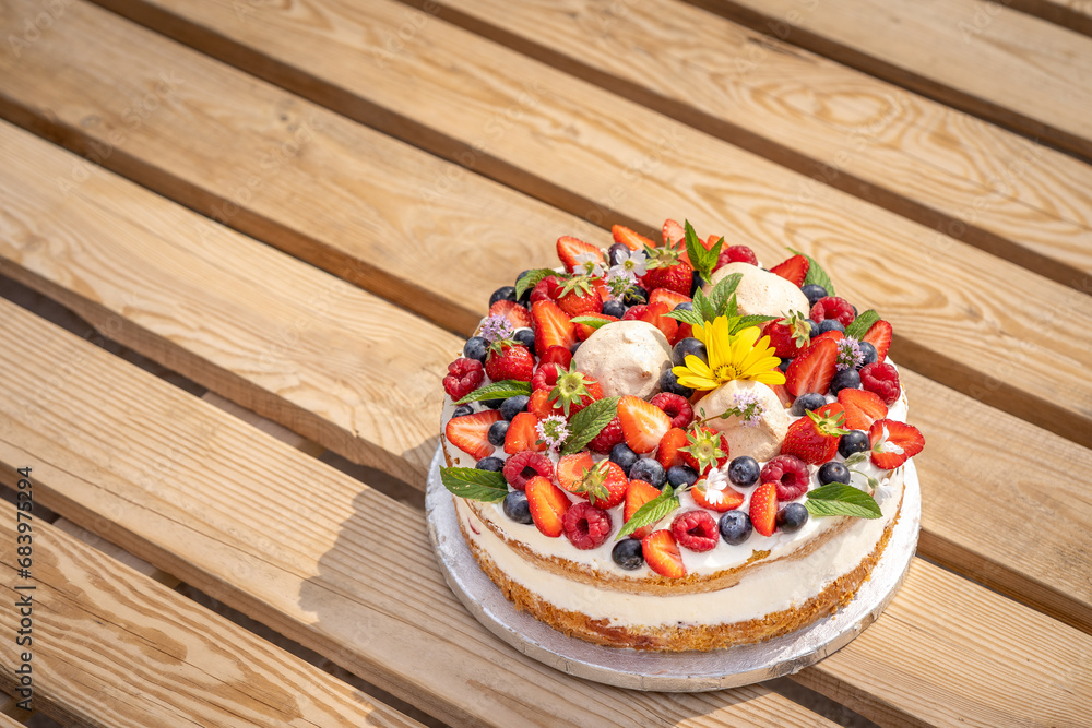 1 first birthday cake pavlova with fresh fruit berries flower candle