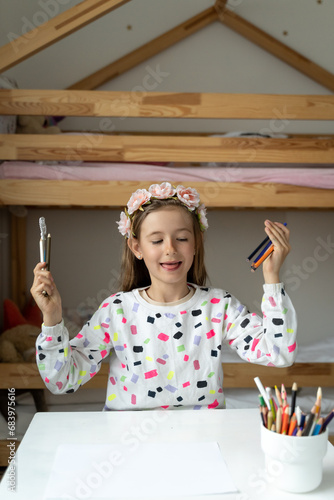 Obraz na płótnie happy little girl in her play room making fun toy colours laugh w salonie