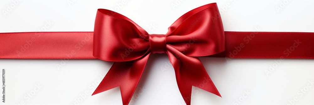 Red ribbon tied in a bow on white background Red ribbon tied in a bow on white background