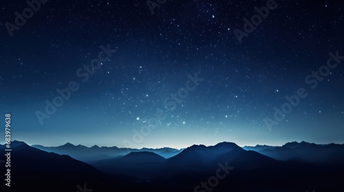  a view of the night sky with stars above a mountain range in the foreground and the moon in the distance.