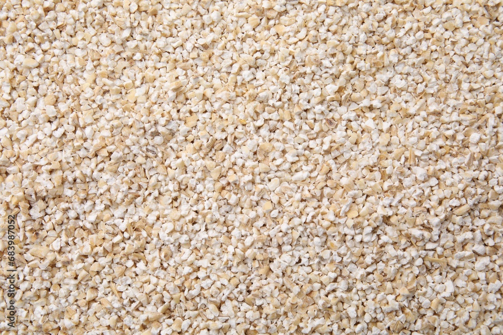 Raw barley groats as background, top view Raw barley groats as background, top view