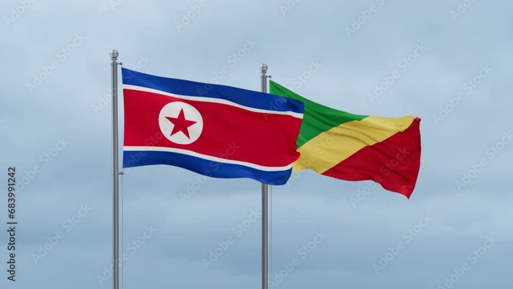 Republic of the Congo flag and North Korea flag waving together on cloudy sky, endless seamless loop, two country relations concept Republic of the Congo flag and North Korea flag waving together on cloudy sky, endless seamless loop, two country relations concept