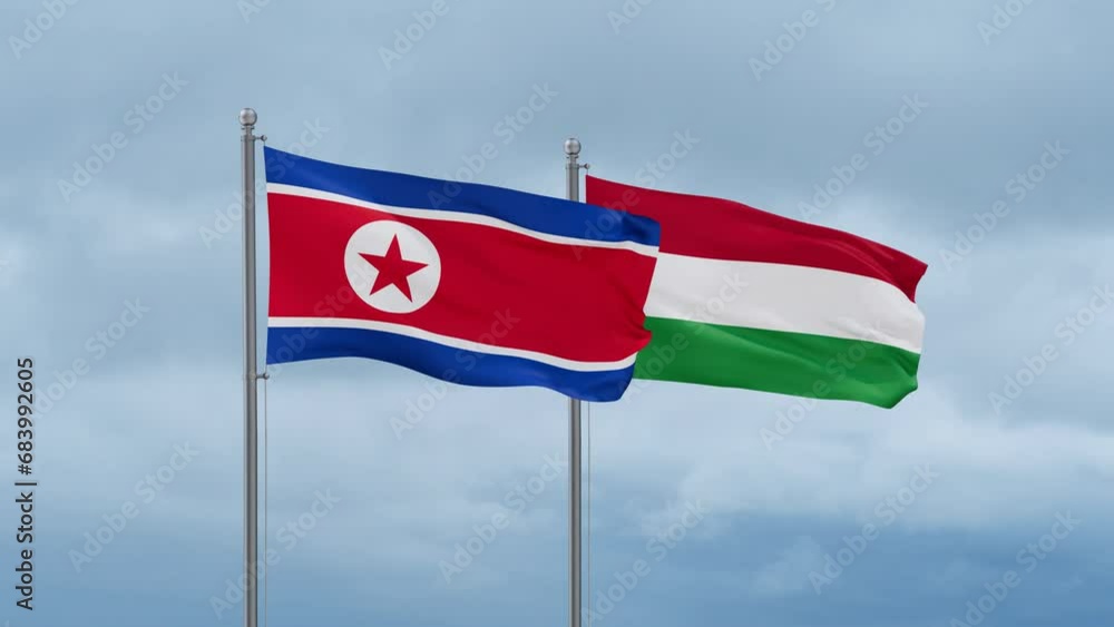 Hungary flag and North Korea flag waving together on cloudy sky, endless seamless loop, two country relations concept Hungary flag and North Korea flag waving together on cloudy sky, endless seamless loop, two country relations concept