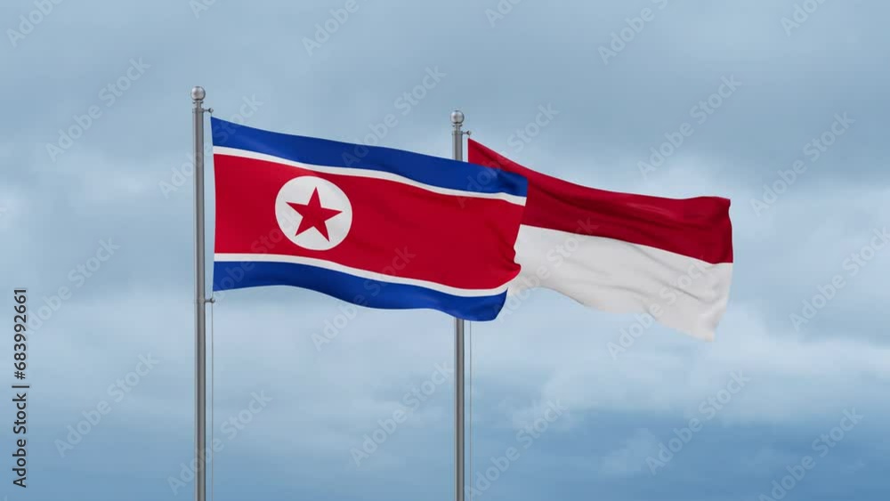 Indonesia flag and North Korea flag waving together on cloudy sky, endless seamless loop, two country relations concept Indonesia flag and North Korea flag waving together on cloudy sky, endless seamless loop, two country relations concept